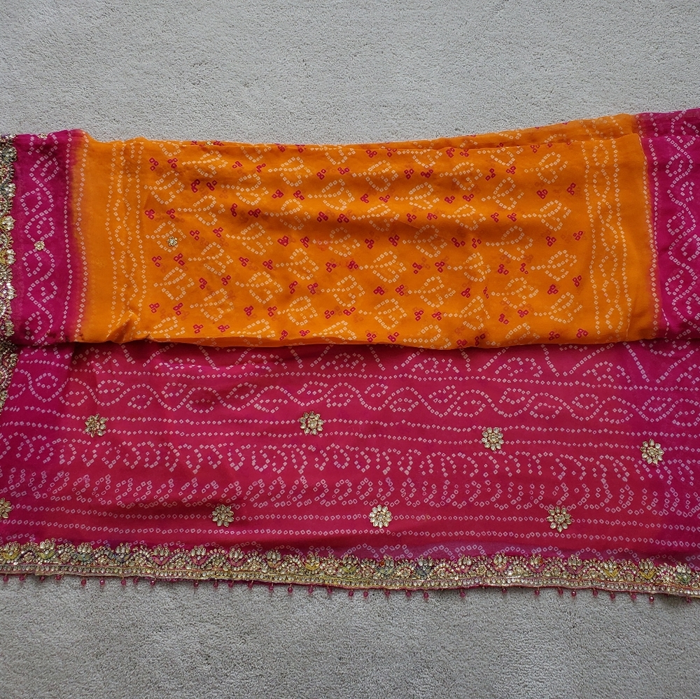 Orange and pink bandhani sari